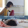 Image for Phoenix Rising Level 3, showing a Japanese student assisting another in a posture