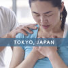 Icon for Phoenix Rising Essentials, showing a Japanese woman with her head bowed and hands over her heart